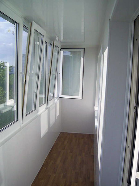 Тёплое и холодное распашное остекление балконов алюминиевым профилем Рошаль
